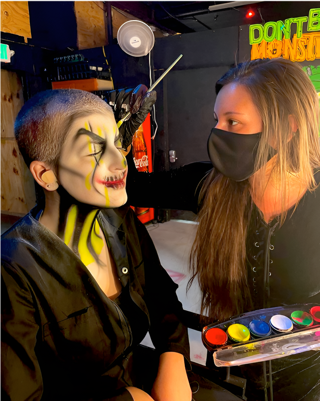 Professional makeup artist creating a performance look